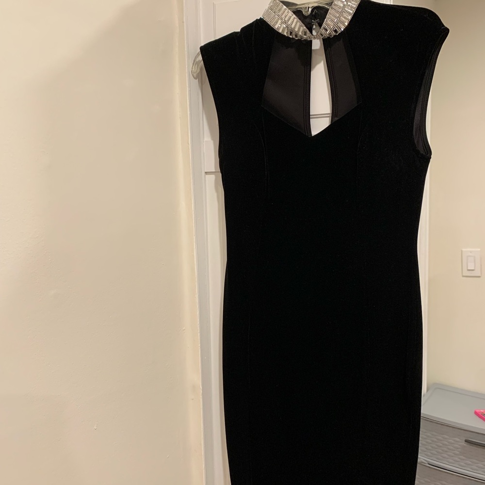 Beautiful black dress with stones around neck size Large